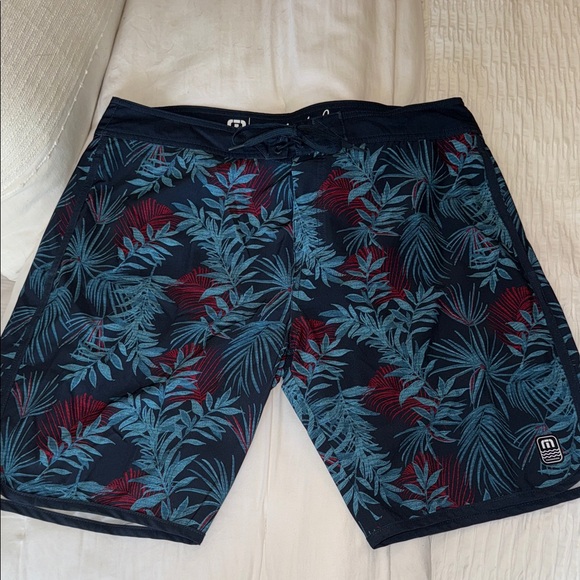 Travis Mathew Navy and Red Tropical Print Board Shorts